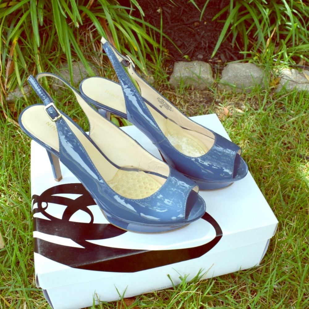 Nine West marine blue open toe, sling backs.